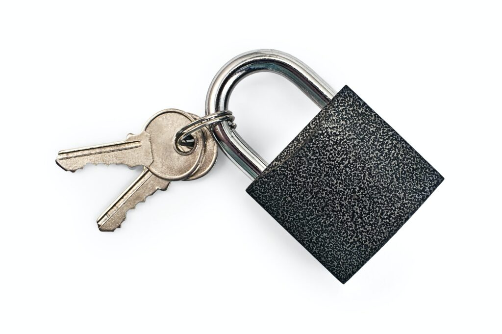 Black padlock with keys